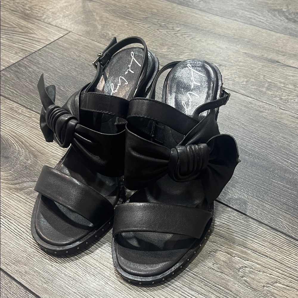 Elegant Black Sandals with Bow by [Brand]